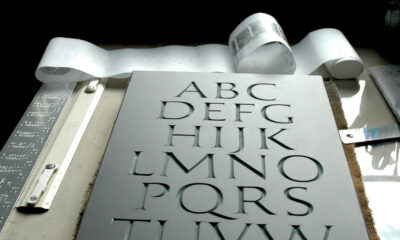 Slate with Roman alphabet carved by Jesse Marsolais.