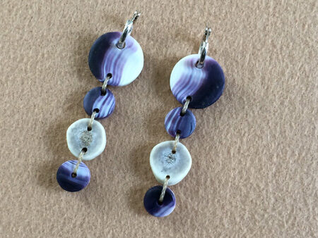 Pair of wampum earrings made by Elizabeth James-Perry.