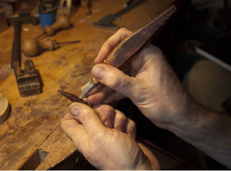 David Hawthorne making a bow by hand.