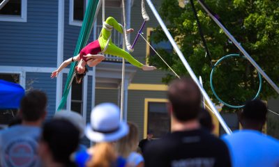 photo of an aerial artist performing at an outdoor festival