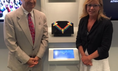 Steven M. Rothstein, Executive Director of the John F. Kennedy Library Foundation, with Anita Walker in the Legacy Room of the JFK Museum.