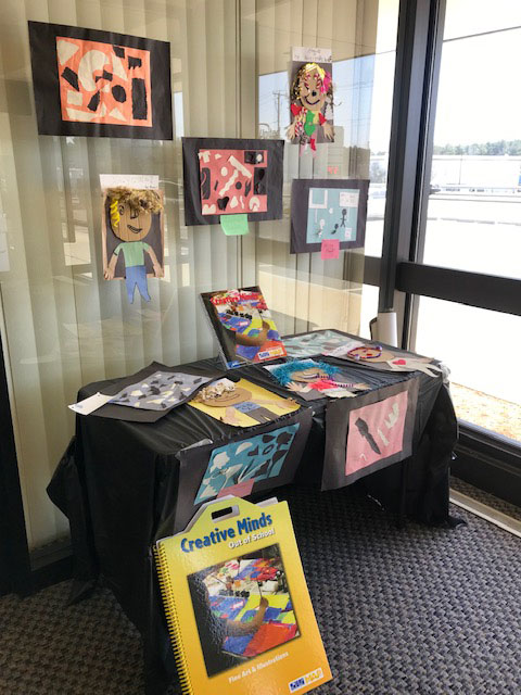 Art by children at Duggan and Moxon Apartments, on display at People’s United Bank on Boston Road.