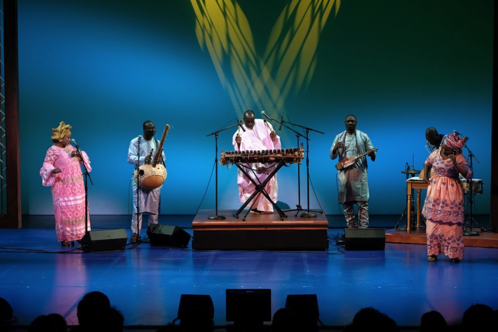 Balla Kouyaté performing (center) at the 2019 NEA National Heritage Fellowships Concert. Photo by Tom Pich.