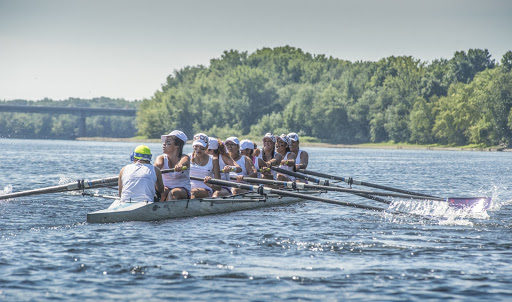 Young women rowing