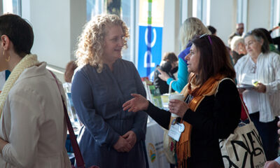 Women talking at a reception