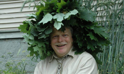 Jonas Stundzia of Lawrence, wearing a crown of oak leaves