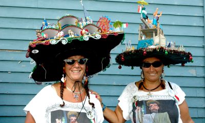 Robyn & Amy Clayton posing in their hats.