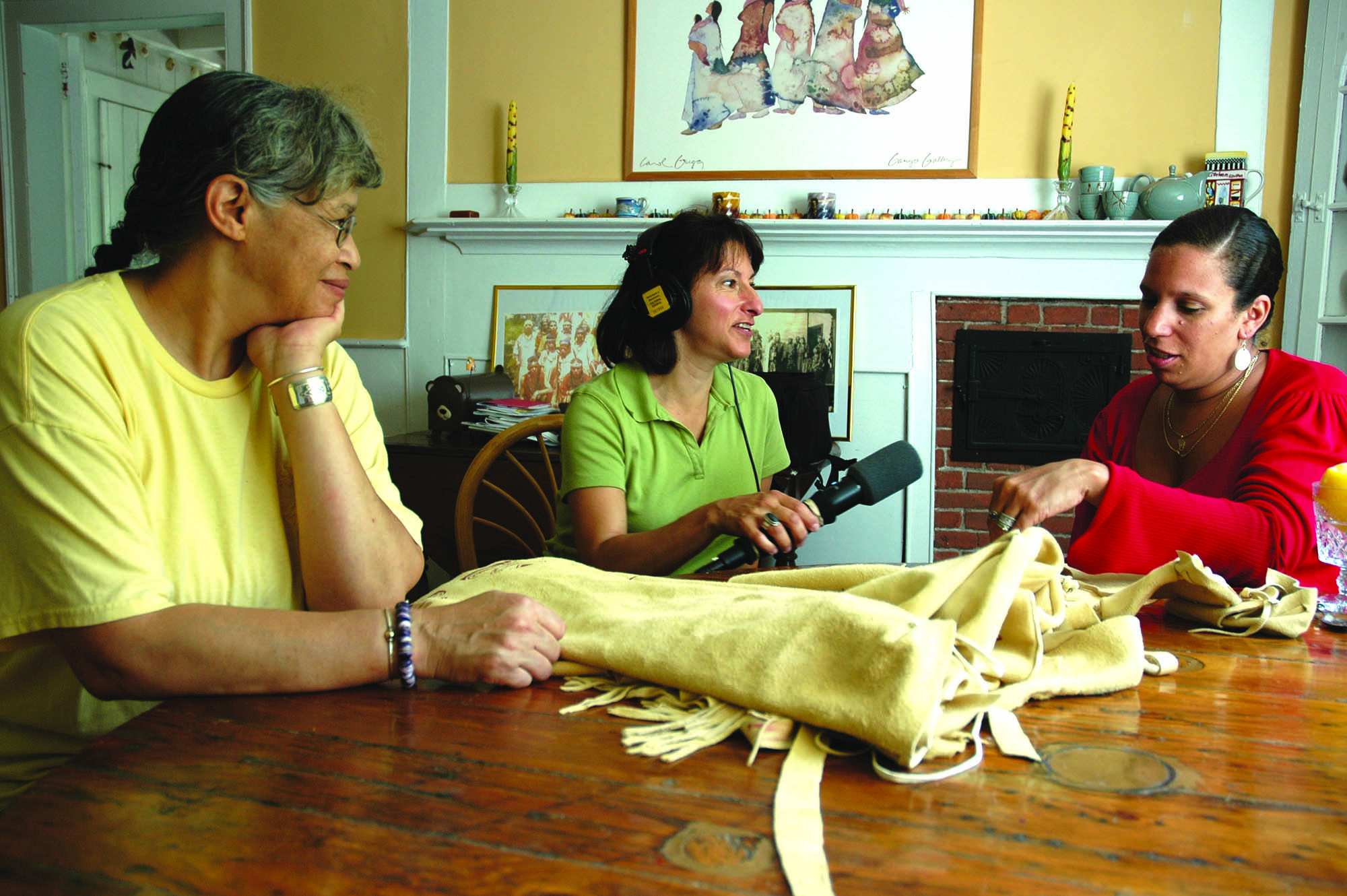 Maggie interviewing Michelle Fernandes and Anita Peters Little about their apprenticeship in Wampanoag regalia making. West Barmstable, MA, 2005. Photo: Russell A. Call.