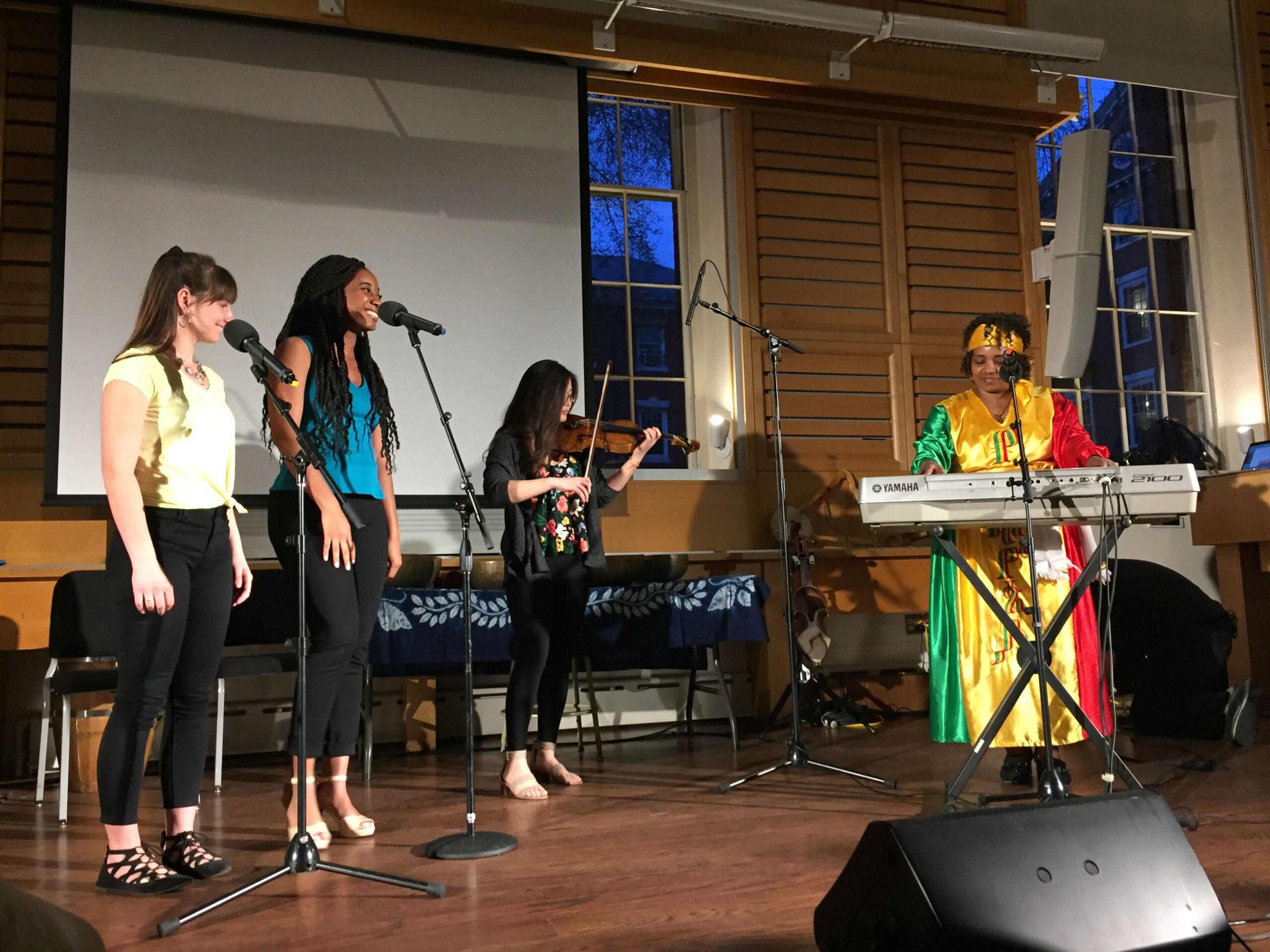 Betty Melaku, Ethiopian musician performing with Harvard students at Holden Chapel. 