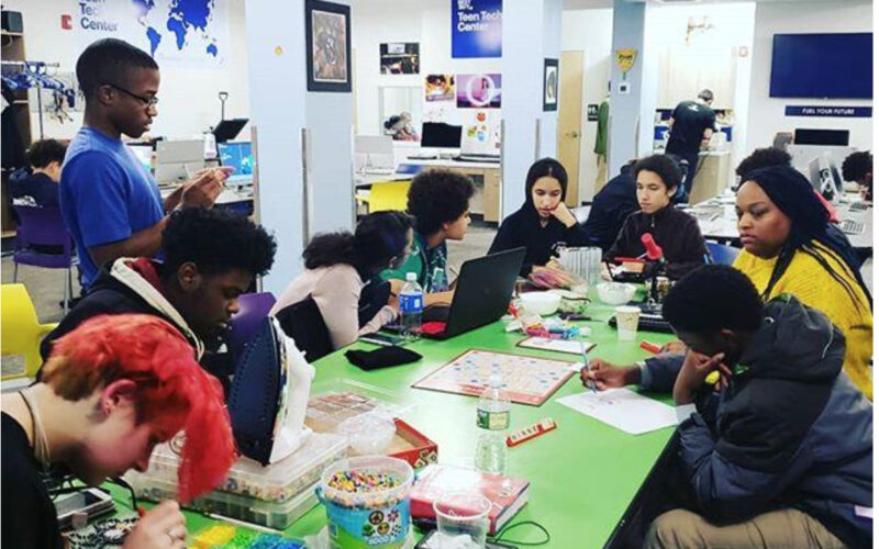 Teens in a creative workshop at The Clubhouse Network