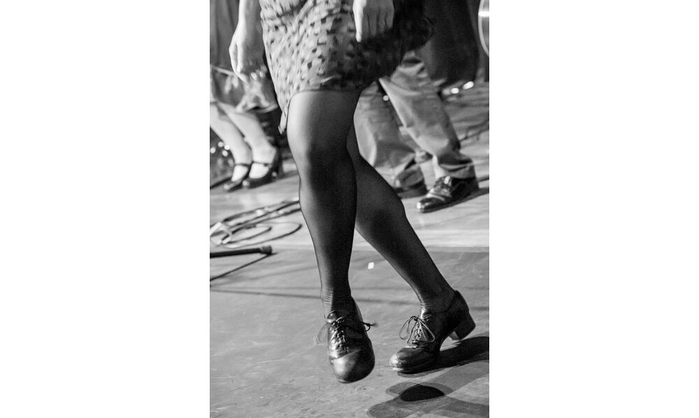 Kieran Jordan dancing on stage at Shalin Liu. Photo by Brendan Mercure.