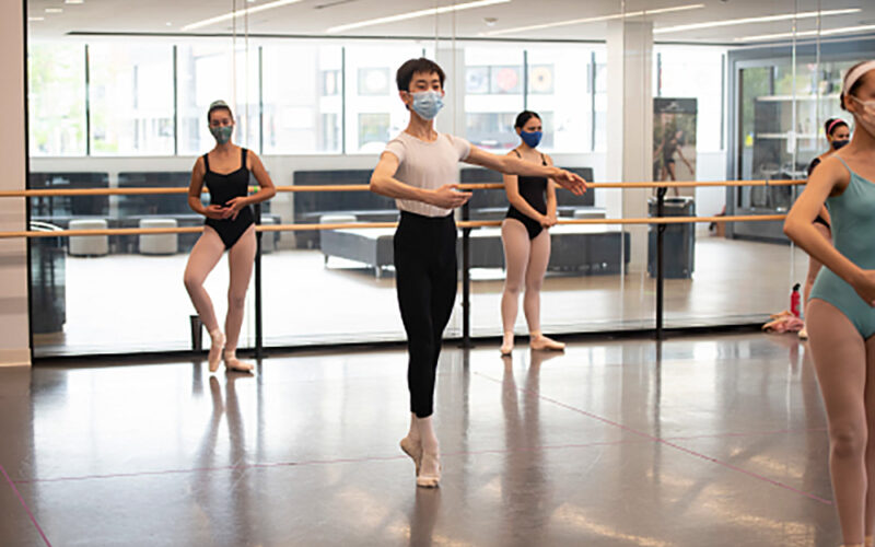 Boston Ballet students wearing masks in the dance studio