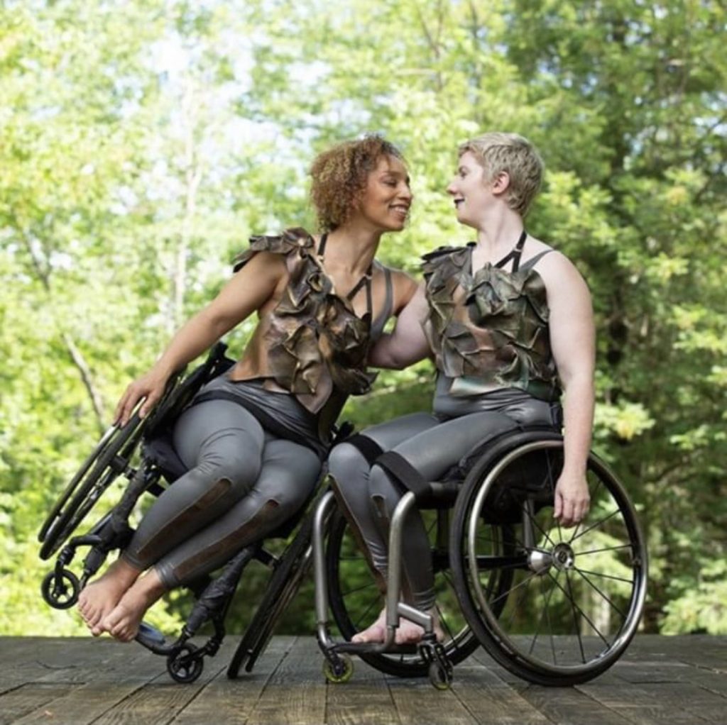 2 dancers in wheelchairs performing at Jacob's Pillow