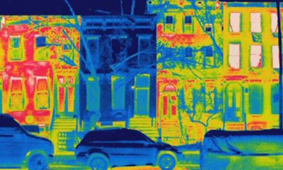 photo of a streetfront using a filter to show the energy escaping from the various structures