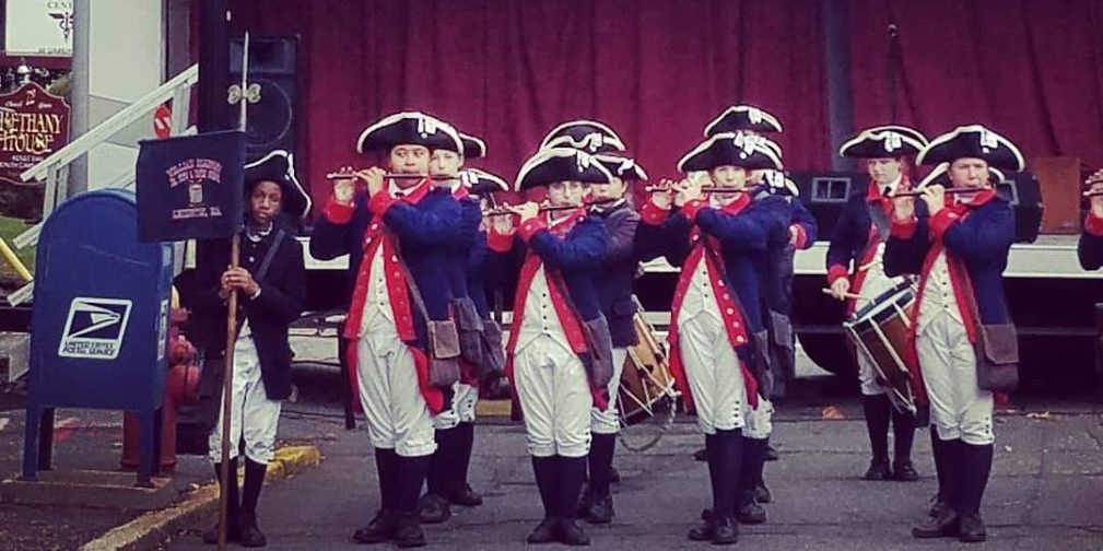 photo of a Fife and Drum Corps performing