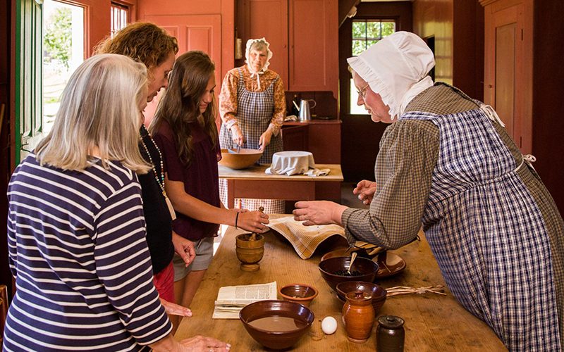Cooking demonstration by historical interpreters