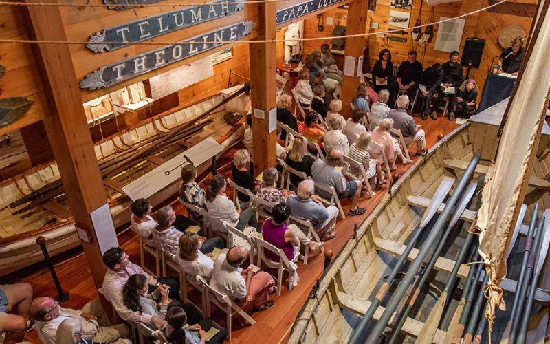 Overhead view of people in row seating at the Shipwreck and Lifesaving Museum