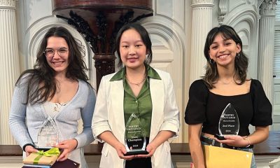 photo of 3 students holding their Poetry Out Loud trophies