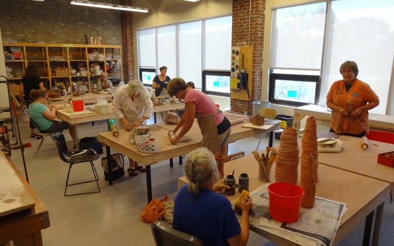 People in a hand building class