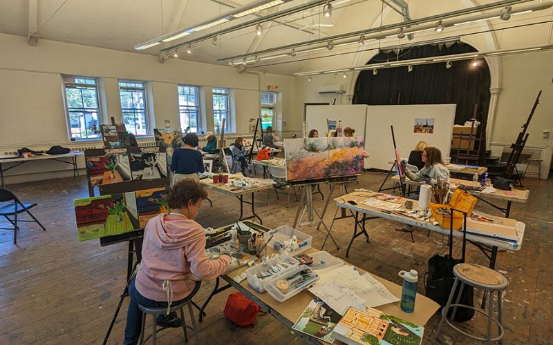 People painting in an art studio