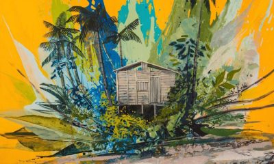 Striking and vibrant painting of a beach shack with an abstracted burst of colors and foliage.