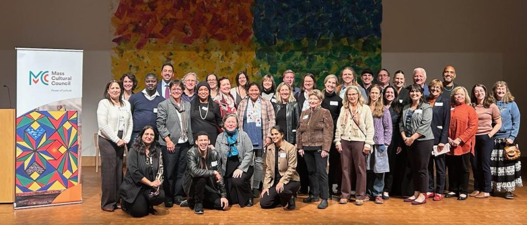 group photo of about 3 dozen attendees at the grant celebration