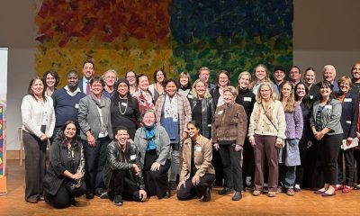 group photo of about 3 dozen attendees at the grant celebration