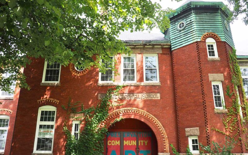 Front entrance and brick exterior of the historic Cogswell School