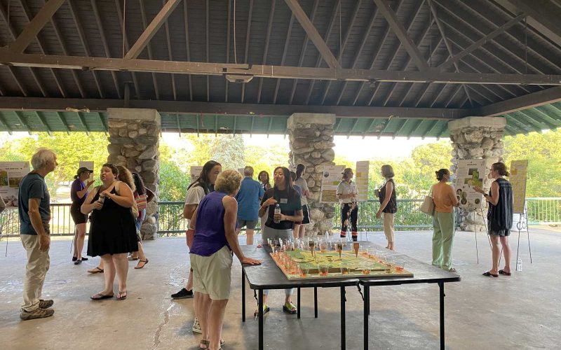 People gathered in an outdoor pavilion