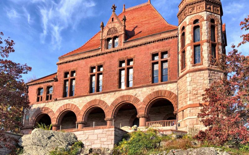 Brick and stone front façade of the historic Oakes Ames Memorial Hall
