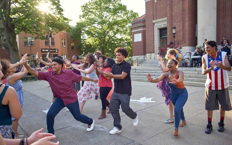 Teens outside the Former Blessed Sacrament Church at Hyde Square Task Force