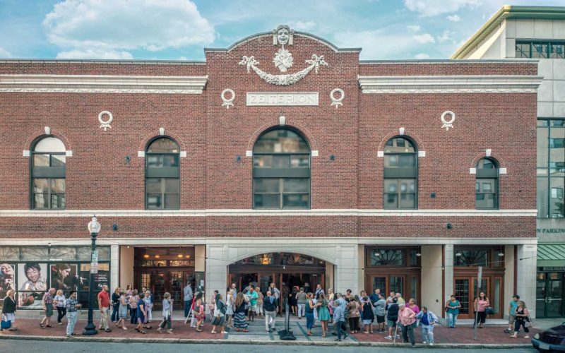 People on the sidewalk and entering into the Zeiterion Theatre