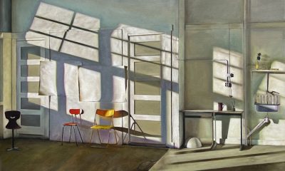 Serene photorealistic painting of an art studio lined with shadows.