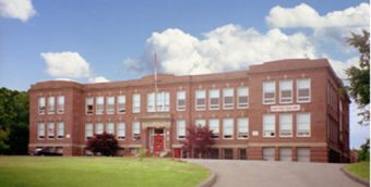photo of an old brick 2 story school building built in the 1920s.