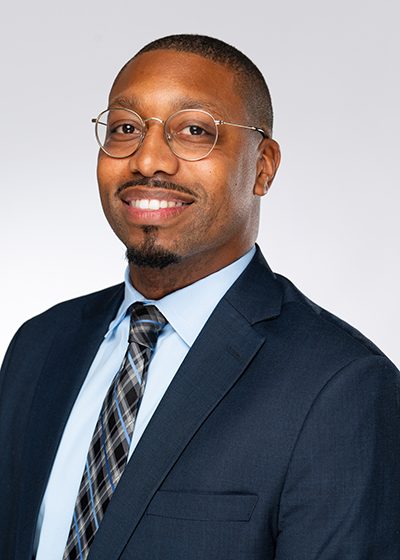 headshot of Ché Anderson.