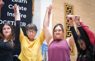 photo of 4 young people just after their performance taking a bow.