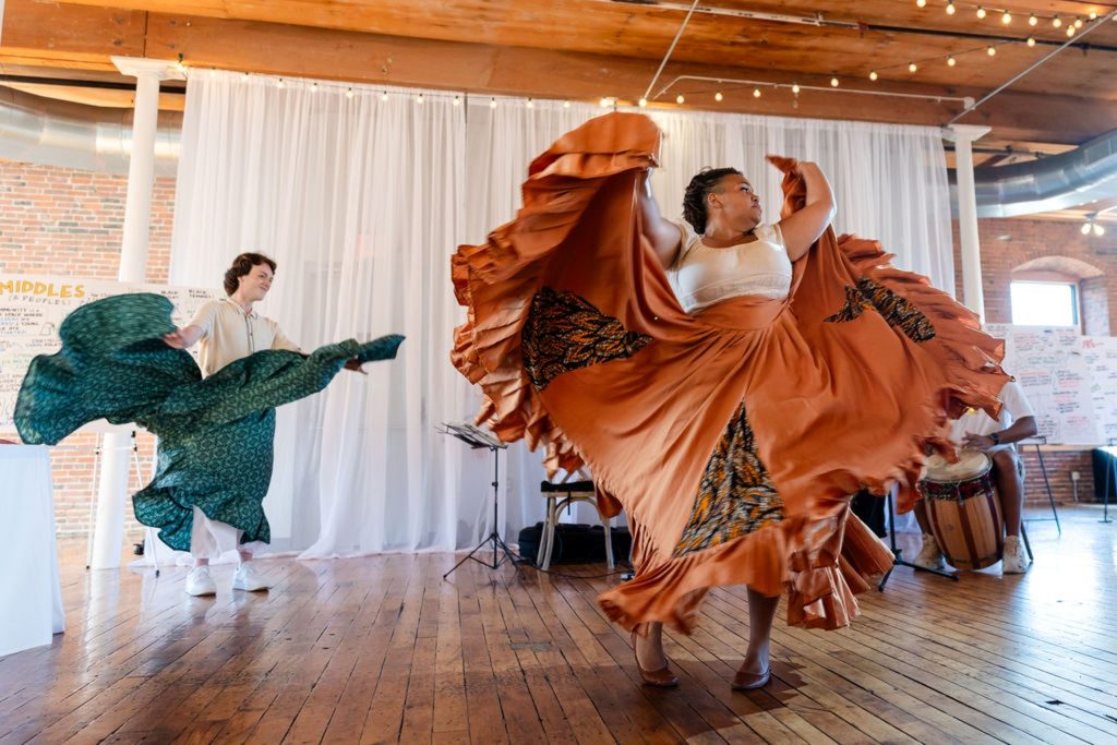 photo of an Afro-Puerto Rican dancers and musicians performing.