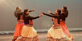 photo of 4 dancers performing.