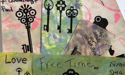 photo of a detail of the larger Key art piece. Handwritten notes include safe space, diversity and community, free time, and love and listening.